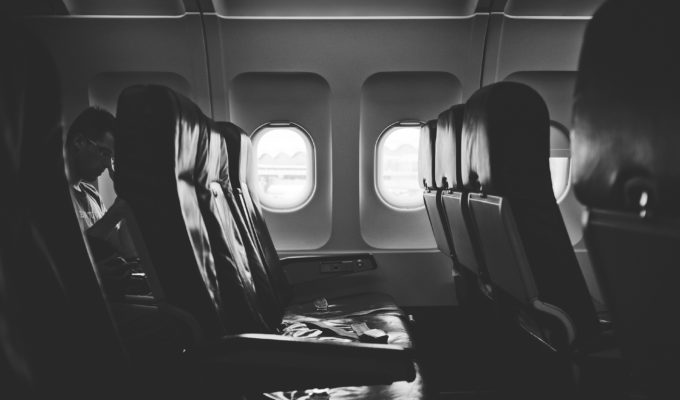 an empty airplane aisle